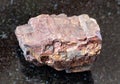 raw Siderite rock on black