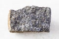 rough Zinc ore (Sphalerite) rock on white marble