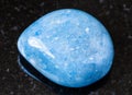 tumbled blue Aventurine gem stone on black