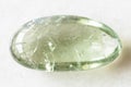 Tumbled Prasiolite green quartz rock on white Royalty Free Stock Photo