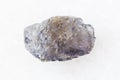 Unpolished Cordierite Iolite crystal on white Royalty Free Stock Photo
