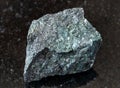 unpolished Magnetite ore on black