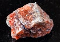 Unpolished red Rock Salt Halite on black