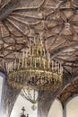 Closeup San Andres Church Original and unique wooden ceiling with big lamp