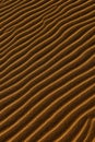 Sand background with a wavy pattern Royalty Free Stock Photo