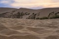 Closeup sand of Sarykum dune at sunset