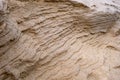 Closeup of sand with waves pattern. Beautiful natural background. Royalty Free Stock Photo