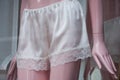 satin shorty on mannequin in fashion store showroom for women