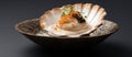 Closeup of scallop in food bowl, a delicious seafood dish Royalty Free Stock Photo