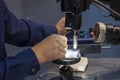 Closeup scene of laser welding operator working with mold parts