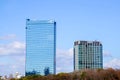 Scenery view of glass and office building on blue sky background. Royalty Free Stock Photo