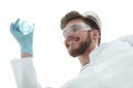 Closeup.scientist holding beaker with the sample