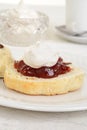 Closeup of scone with cream and jam Royalty Free Stock Photo