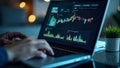 Closeup screen of the laptop or notebook device, displaying the colorful website traffic metrics, graphs and analytics