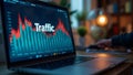 Closeup screen of the laptop or notebook device, displaying the colorful website traffic metrics, graphs and analytics