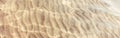 Closeup of sea ocean sand ground with waves ripples. Royalty Free Stock Photo