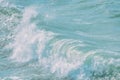 Closeup sea wave splash, crystal clear blue ocean wave, blue water in pastel colors Royalty Free Stock Photo