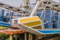 Closeup of seats of broken abandoned carnival ride Royalty Free Stock Photo