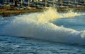 Closeup of seawater splashing on the beach Royalty Free Stock Photo