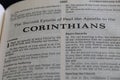 Closeup of the second Book of Corinthians from Bible, with focus on the Title of religious text. Royalty Free Stock Photo