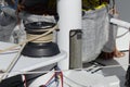 Closeup of secured rope on winch on board sailing boat racer