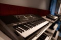 Closeup selective focus on keyboard of new electric synthesizer at shop showcase Royalty Free Stock Photo