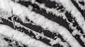 Closeup selective focus on snow packed in an all-weather tire tread. Royalty Free Stock Photo