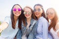 A closeup selfie of groups of female students in nature Royalty Free Stock Photo