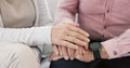 Closeup of senior couple holding hands for love, care and trust in retirement. Old man, woman and helping hand for Royalty Free Stock Photo