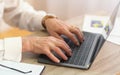 Closeup Of Senior Man`s Hands Working Typing On Laptop, Cropped Royalty Free Stock Photo