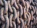 Closeup of a series of rusty old metal chain links Royalty Free Stock Photo