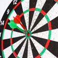 Closeup. several Arrows dart hitting the center of the target d
