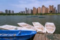 Closeup of several boats on the lake