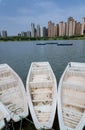 Closeup of several boats on the lake