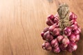 Closeup shallot onion group on wood background