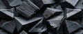 Closeup of sharp angular black coal pieces stacked together