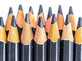 Closeup of sharpened black pencils, showcasing texture and detail. A powerful visual metaphor for creativity, teamwork, or Royalty Free Stock Photo