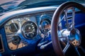 Closeup of shiny interior details of a vintage car under the lights Royalty Free Stock Photo