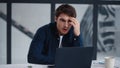 Closeup shocked business man looking computer screen in office