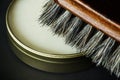 Closeup of shoe brush and polish Royalty Free Stock Photo