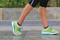 Closeup on shoe, Woman running on morning in the park, fitness and healthy lifestyle concept