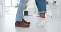 Closeup, shoes and couple in tiptoe moment, romance and sweet relationship in their home. Feet, love and man with woman Royalty Free Stock Photo