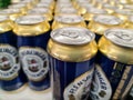 Closeup shot of aluminum beer cans of the brand Flensburger Pilsener ready for sale Royalty Free Stock Photo