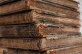 Closeup shot of ancient old books in a pile - vintage concept