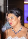 Closeup shot of Anna Netrebko in the hallway with fans after her concert in Madrid, Spain