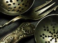 A closeup shot Antique Silver cutlery on slate