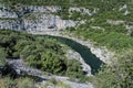 Closeup shot of Ardeche Gorges with forested canyons and a mountain river