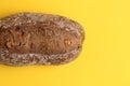 Closeup shot of artisanal brown bread with nut pieces