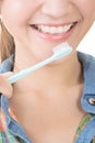 Closeup shot of asian woman brushing teeth Royalty Free Stock Photo