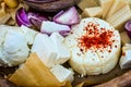 Closeup shot of an assortment of different cheese types with onion Royalty Free Stock Photo